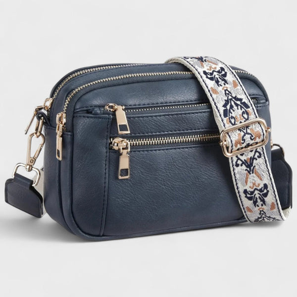 Olivia - Bolso bandolera con correa estampada